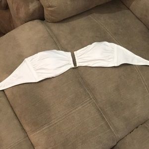 White, strapless bathing suit top.